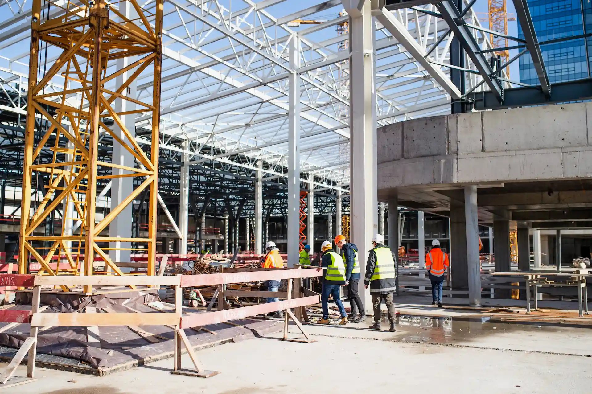 Group of engineers standing on construction site